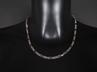 Vente aux enchères Collier souple en argent, maille figaro.  Long. 45 cm Poids. 13,01 g  