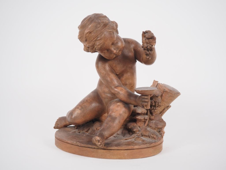 René ROD. "bacchus enfant" Sujet en terre cuite  Signé H. 33,5 cm (pet