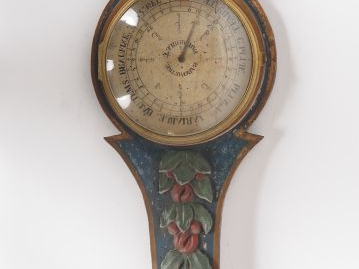 Baromètre début XIXème en bois peint, à décor en relief de fleurs poly