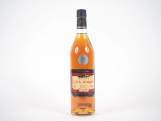 Vente aux enchères 1 BOUTEILLE COGNAC FINE COGNAC V.S.O.P 'RÉSERVE' L. DE LA MONTAGNE 