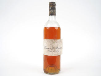 Vente aux enchères 1 VIEILLE BOUTEILLE EAU DE VIE DE PRUNE DE MOUTON ROTHSCHILD - VIDANGE