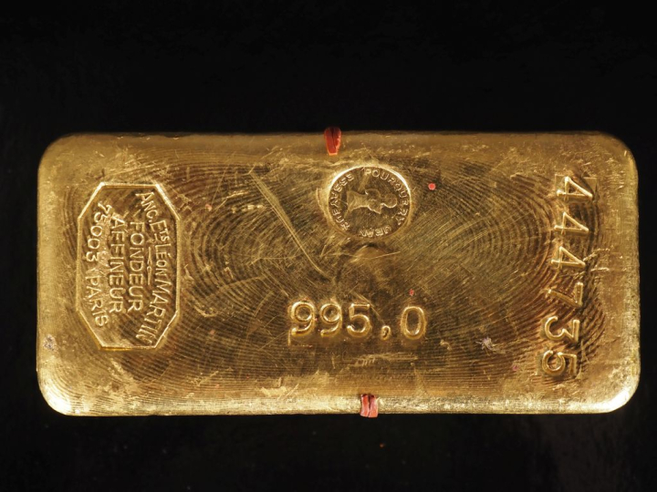 Lingot d'or. Numéroté 444.735 Titre 995,0.  Poids brut. 1002,9 g Fonde