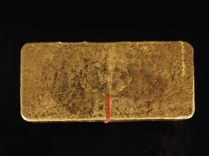 Lingot d'or. Numéroté 444.735 Titre 995,0.  Poids brut. 1002,9 g Fonde