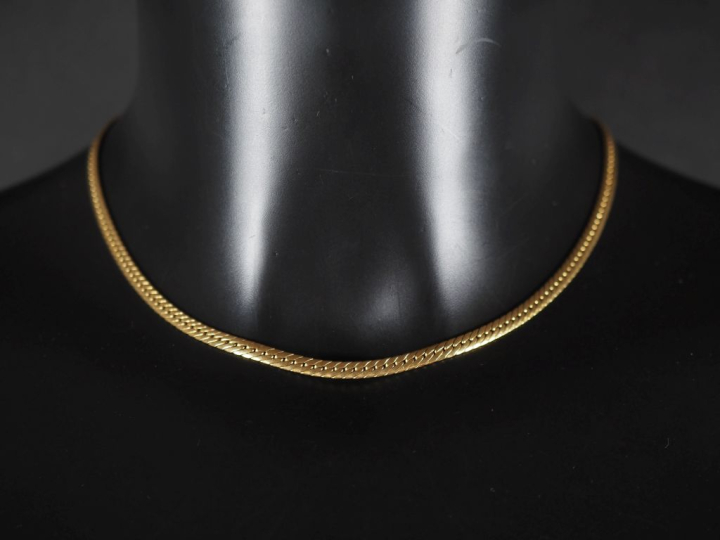 Collier souple en or jaune 750, maille gourmette plate.  Long. 40 cm P