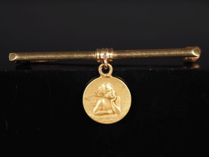 Petite broche barrette en or jaune 750, ornée d'un médaillon en pendel