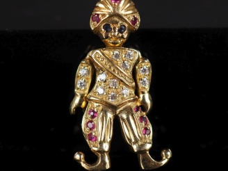 Vente aux enchères Pendentif articulé en or jaune 750, figurant un homme au turban serti 