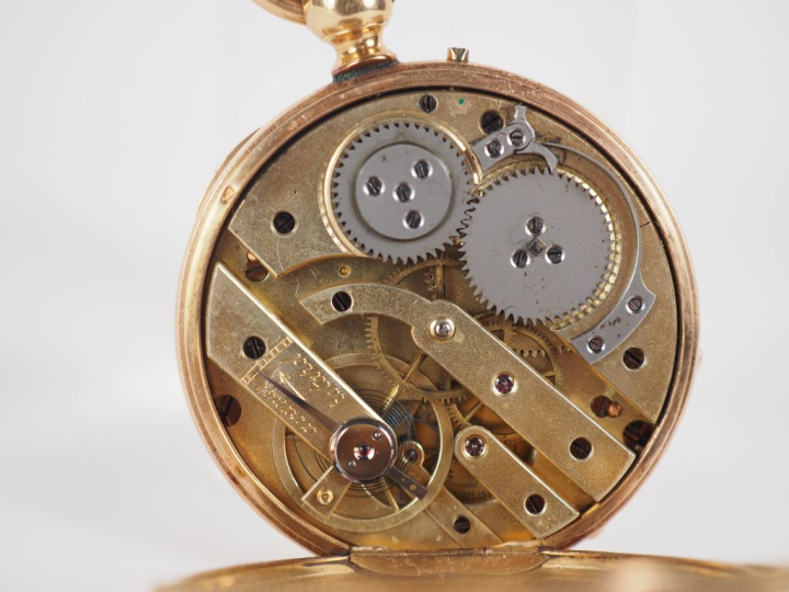 Montre de gousset Napoléon III en or jaune 750.  Cadran à chiffres rom