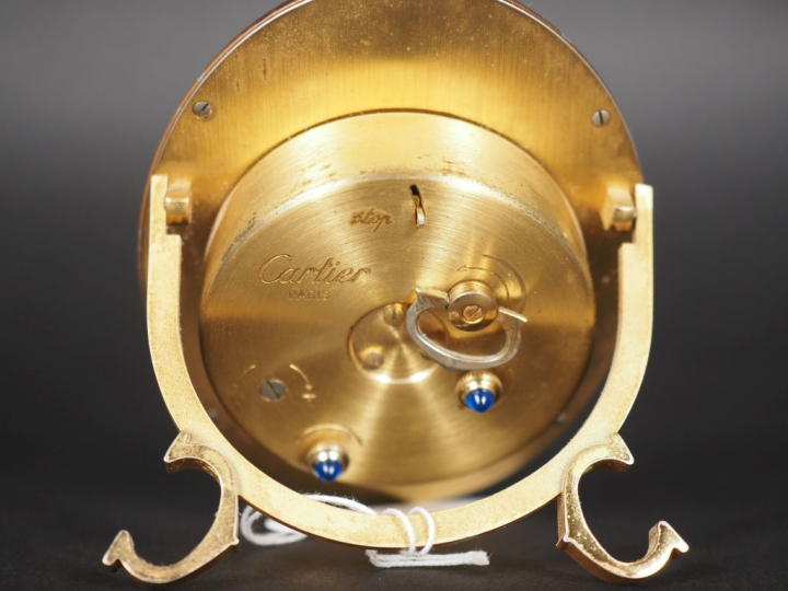 CARTIER, Paris Pendulette baignoire ou réveil de table en métal doré e
