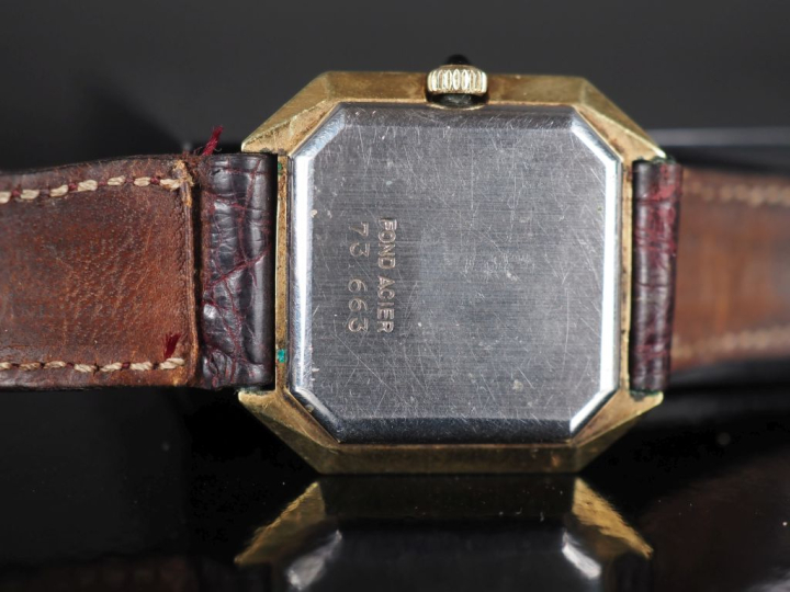 EMILE PEQUIGNET Montre bracelet de dame. Boitier octogonal à pans coup