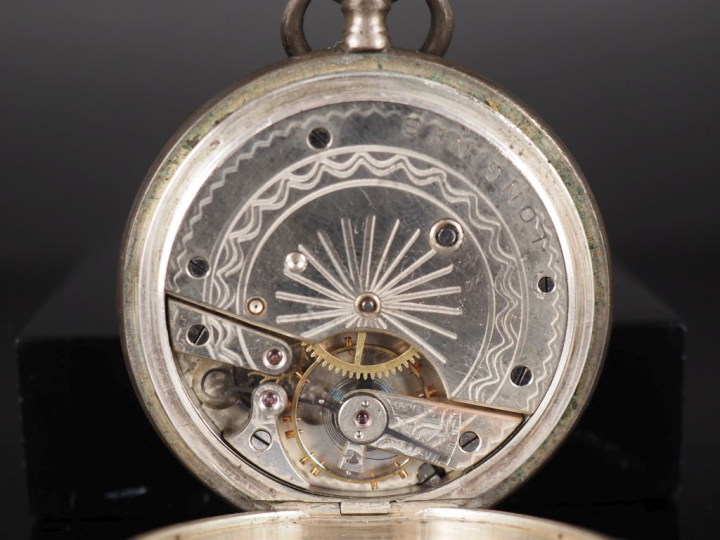 LONGINES Montre aveugle de gousset en argent 800. Cadran à chiffres ro