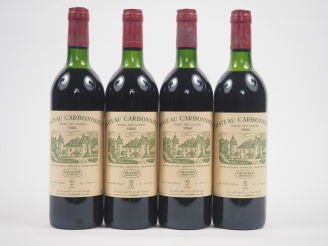 Vente aux enchères 4 BOUTEILLES CHÂTEAU CARBONNIEUX GCC GRAVES - 1984 - 4 LB 