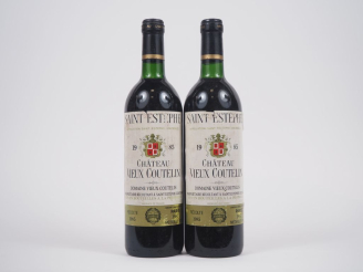 Vente aux enchères 2 BOUTEILLES CHÂTEAU VIEUX COUTELIN ST ESTÈPHE - 1985 - BG 