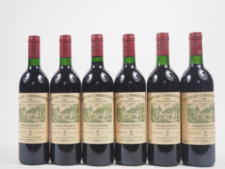 Vente aux enchères 6 BOUTEILLES CHÂTEAU CARBONNIEUX GCC GRAVES - 1990 