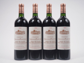 Vente aux enchères 4 BOUTEILLES CHÂTEAU GRAND PONTET GCC ST ÉMILION - 2002