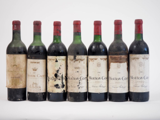 Vente aux enchères 7 BOUTEILLES MOUTON CADET BORDEAUX : 1 DE 1966 MEP - 1 NM BEP - 2 MILL