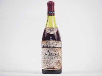 Vente aux enchères 1 BOUTEILLE LA TÂCHE DOMAINE DE LA ROMANÉE CONTI - 1982 - 5,6 CM/ET/CA
