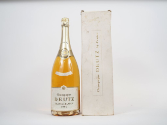 Vente aux enchères 1 MAGNUM CHAMPAGNE DEUTZ - 1995 - COFFRET ABIMÉ