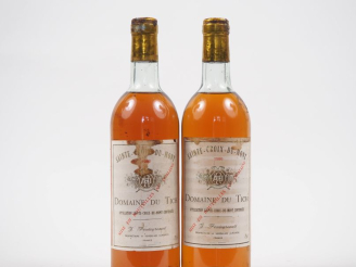 Vente aux enchères 2 BOUTEILLES DOMAINE DU TICH SAINTE CROIX DU MONT - 1986 - LB/ET/CAPSU