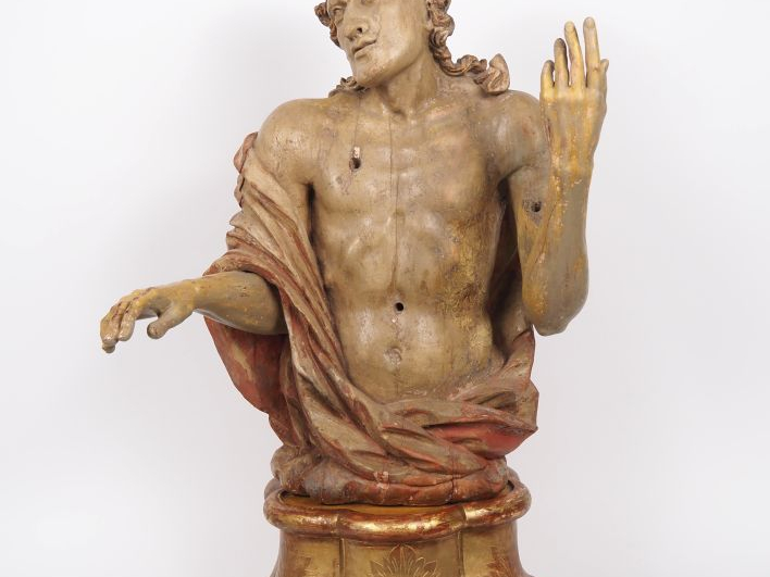 Buste de saint Sébastien en bois sculpté et polychromé. Tête à la chev