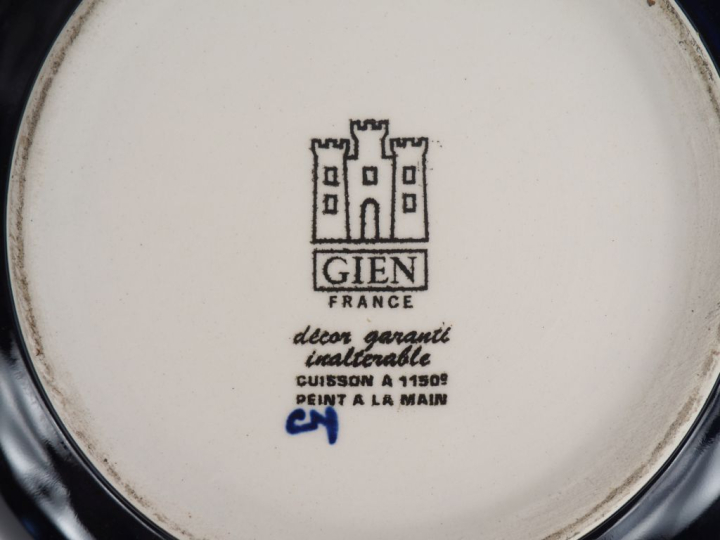 GIEN.  4 différentes verseuses en faience, décor de style Renaissance 
