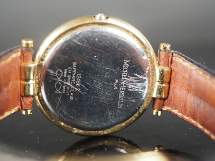 MICHEL HERBELIN, Newport Montre bracelet en métal.  Cadran rond à fond