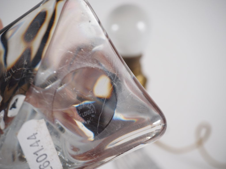 SAINT-LOUIS.  Paire de bougeoirs en cristal en forme d'oiseau stylisé.