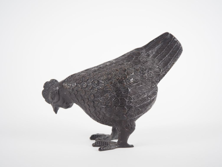 Sujet en métal patiné, "poule faisane". Dim. 14 x 17 cm.