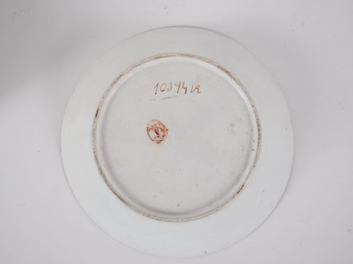 Tasse et sous tasse début XIXème en porcelaine à décor en grisaille de