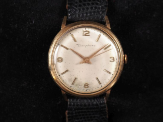 Vente aux enchères DAUPHINE Montre bracelet, boitier en or jaune 750.  Cadran à chiffres 