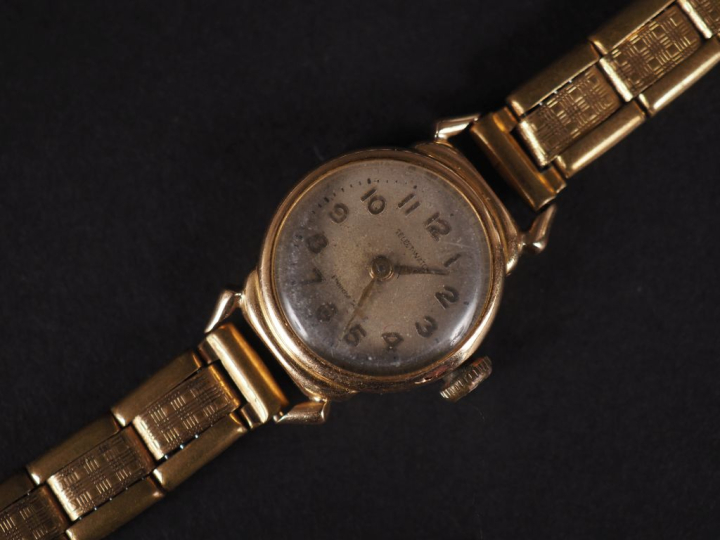 SELECT WATCH Montre bracelet de dame, boitier en or jaune 750.  Cadran