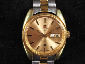 Vente aux enchères TISSOT, Seastar Automatic Montre bracelet en métal doré et argenté.  C